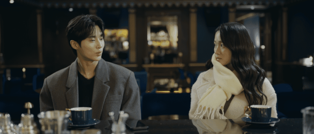 K-drama couple at L'Escape Hotel lounge with cocktails